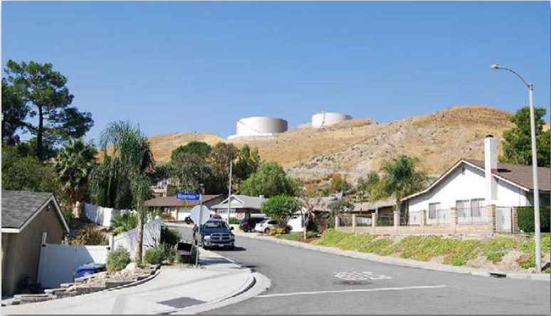Viewpoint 1. Rendering of new Deane Tank - Looking westerly from the intersection of Winterdale Drive and Alder Peak